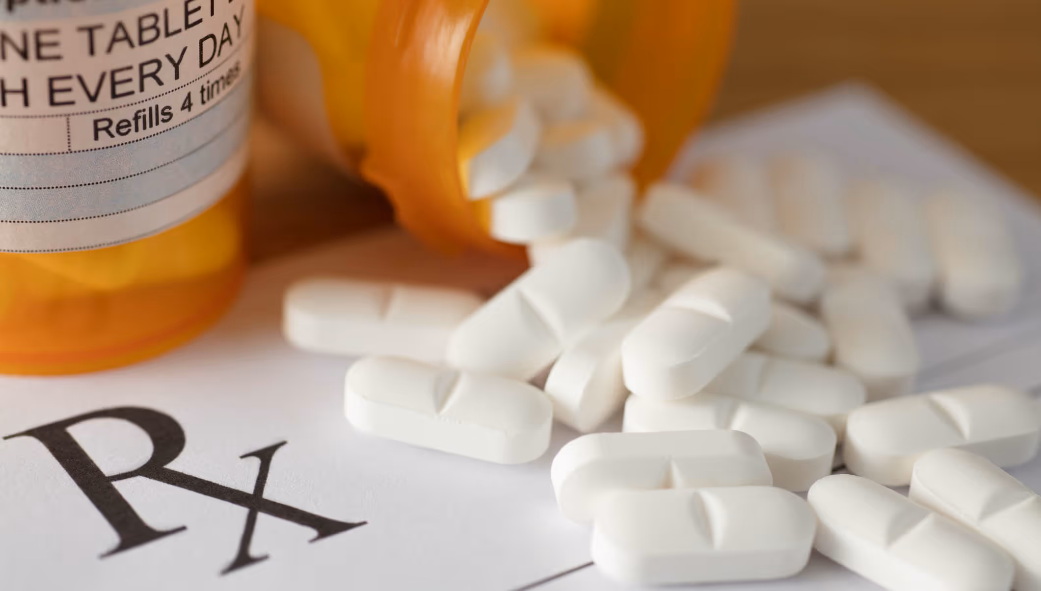 Bottle of prescription medications with Rx document|Opioid and Narcotic Abuse Lawsuit Filed Against Reza Ehsan, M.D.|Opioid and Narcotic Abuse Lawsuit Filed Against Reza Ehsan, M.D.