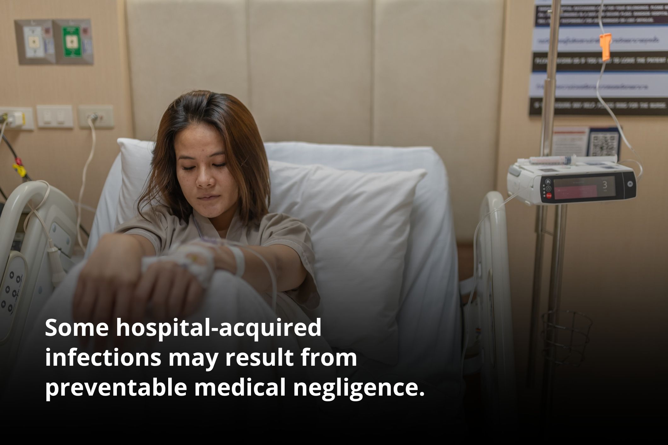Sick woman waiting in a hospital bed for an Irvine hospital infection lawyer.