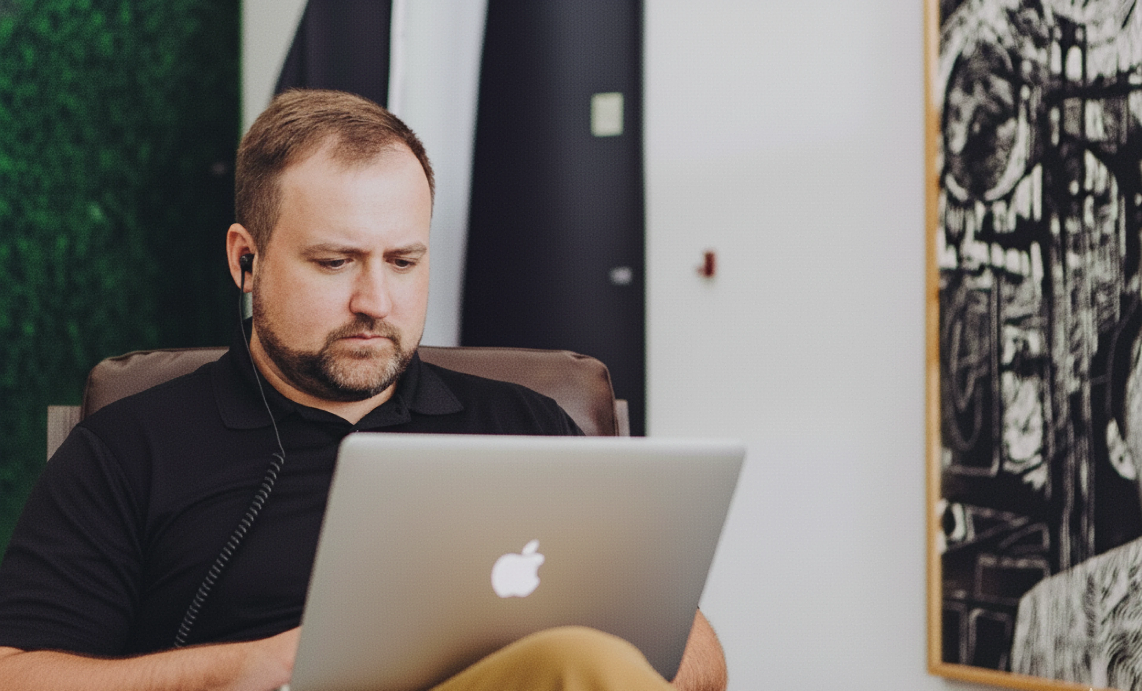 Security professional completing a verified online training session on a laptop.
