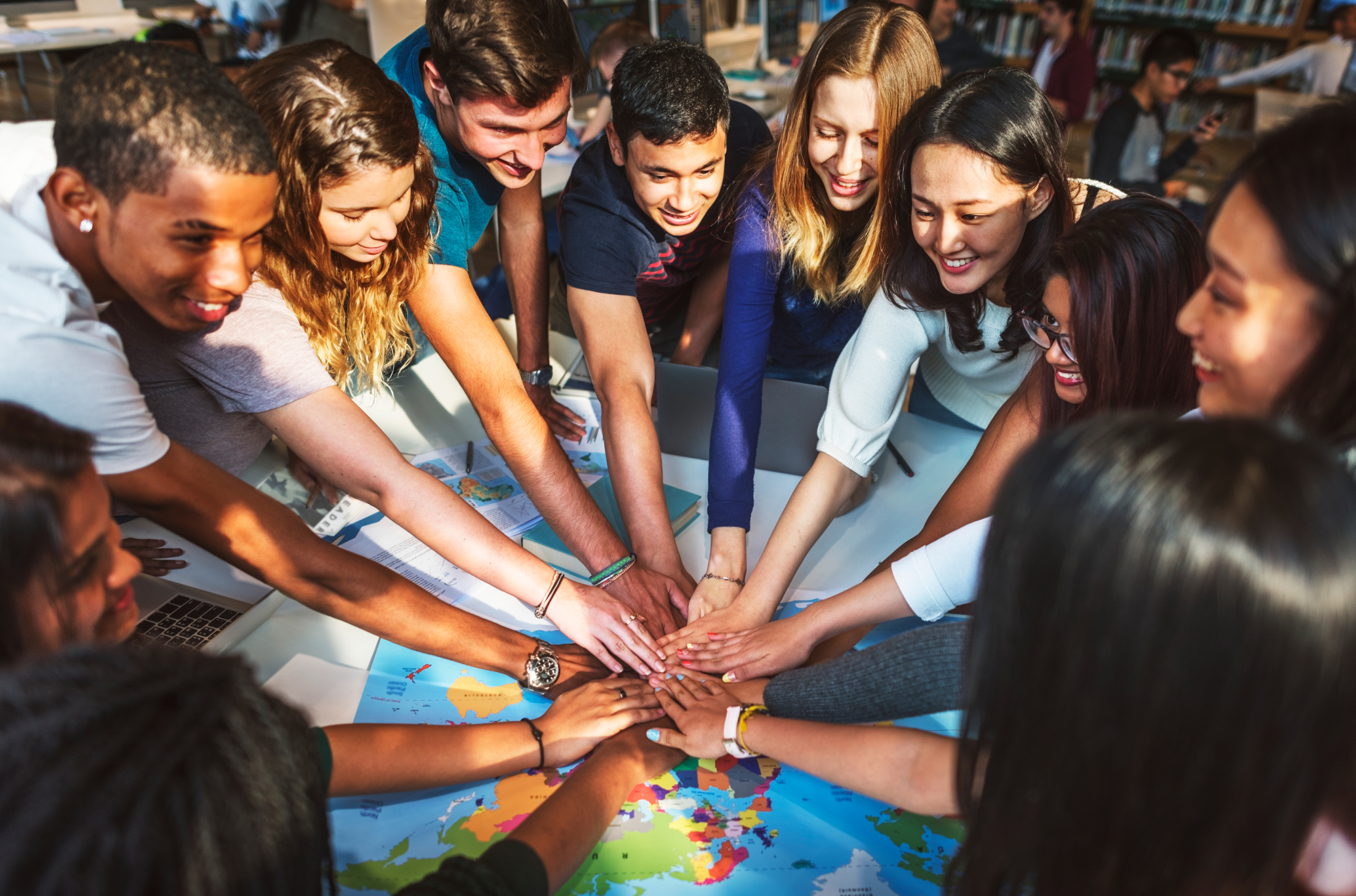 people form different countried joining hands
