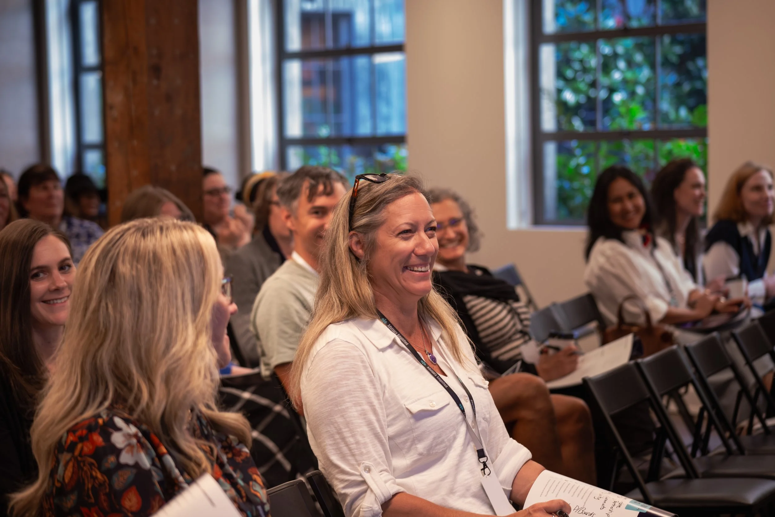 Advisory Amplified — speaker presenting at the lectern