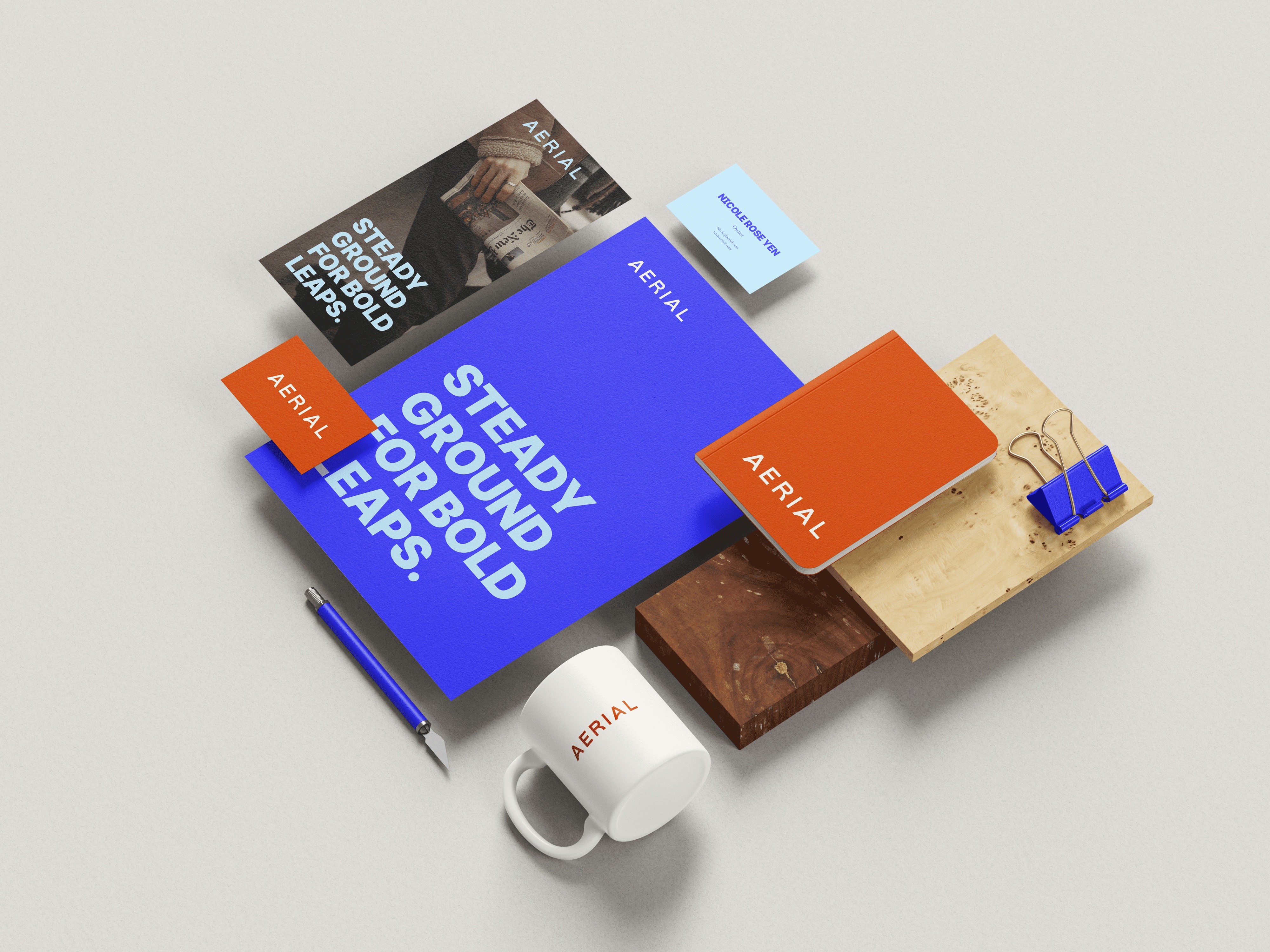 Aerial business cards and letterhead in the finalized identity