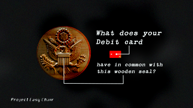The US Great Seal next to a Debit Card