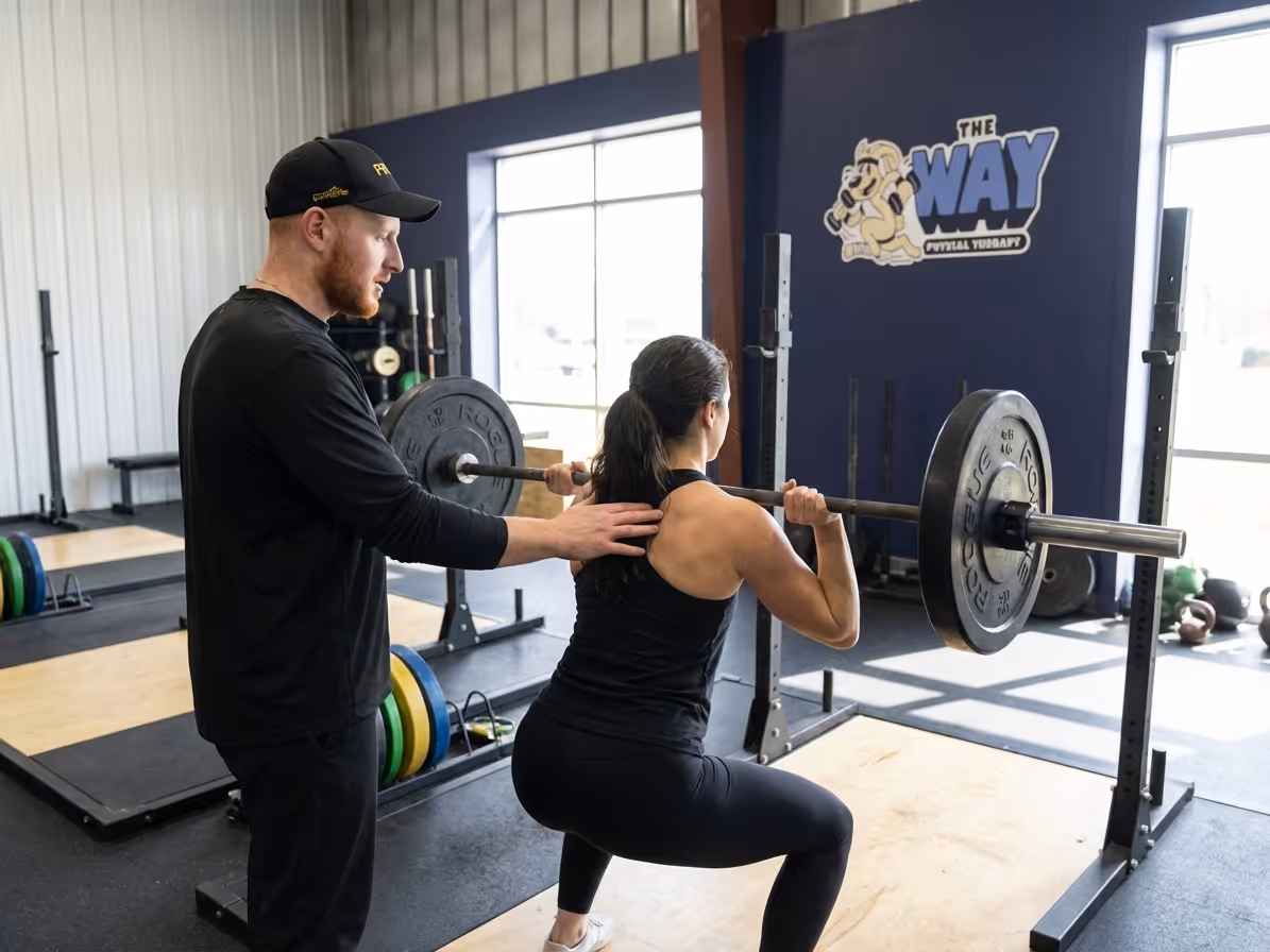 Patient working with a provider at a performance physical therapy clinic in Columbus