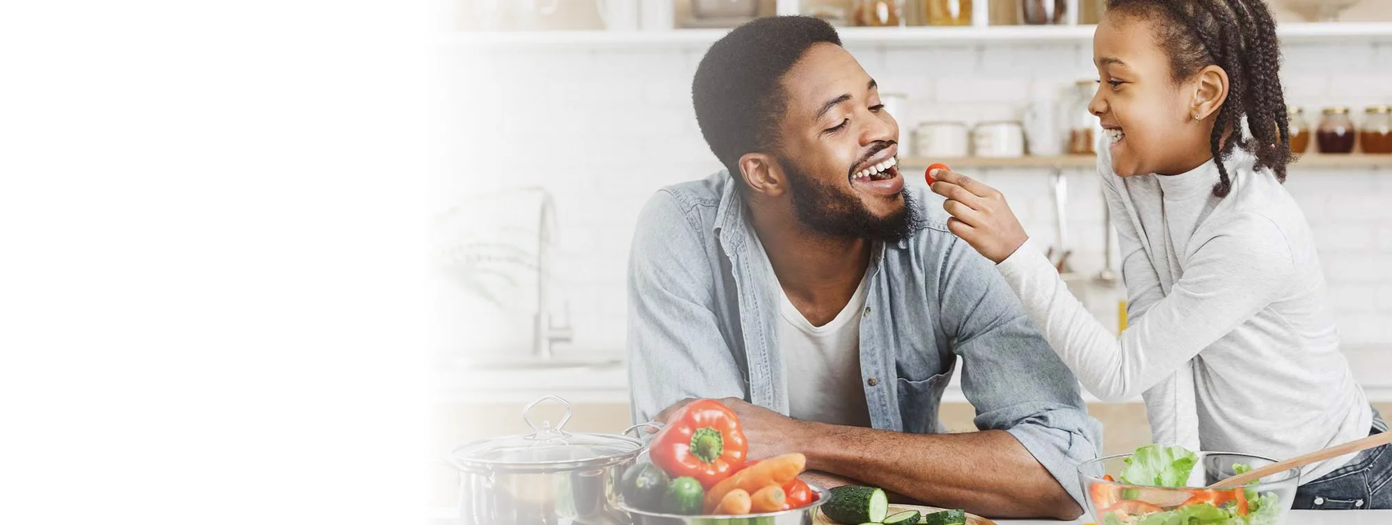 father and daughter enjoying snacks