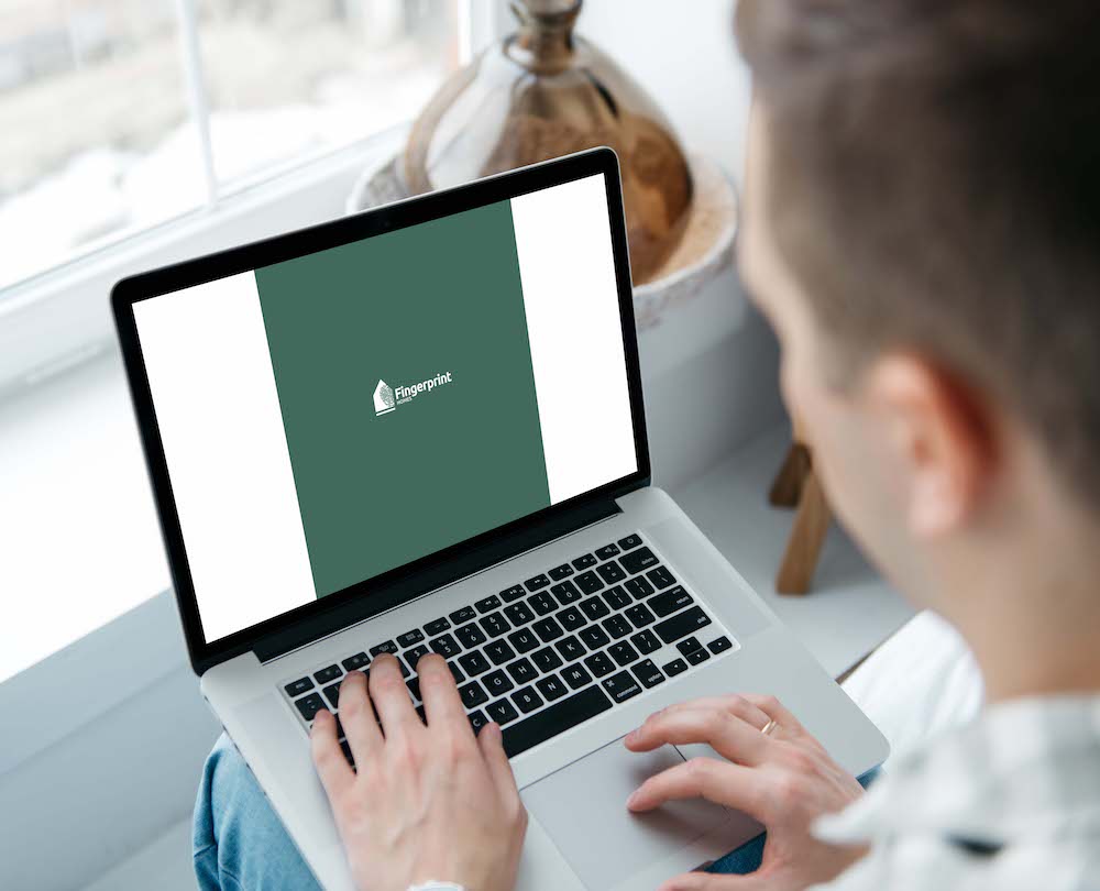 Person-Working-on-Macbook-Mockup