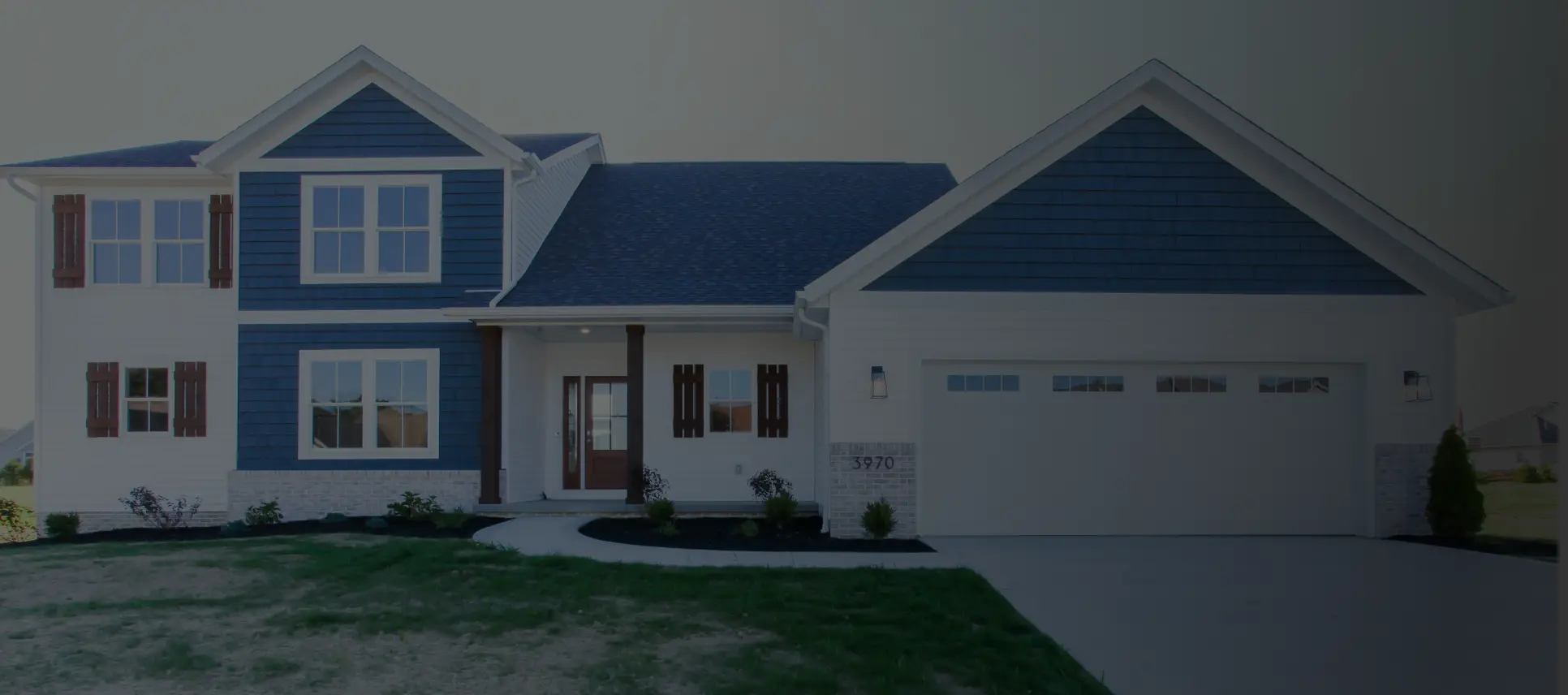 blue-and-white-colored-custom-home-with-gradient
