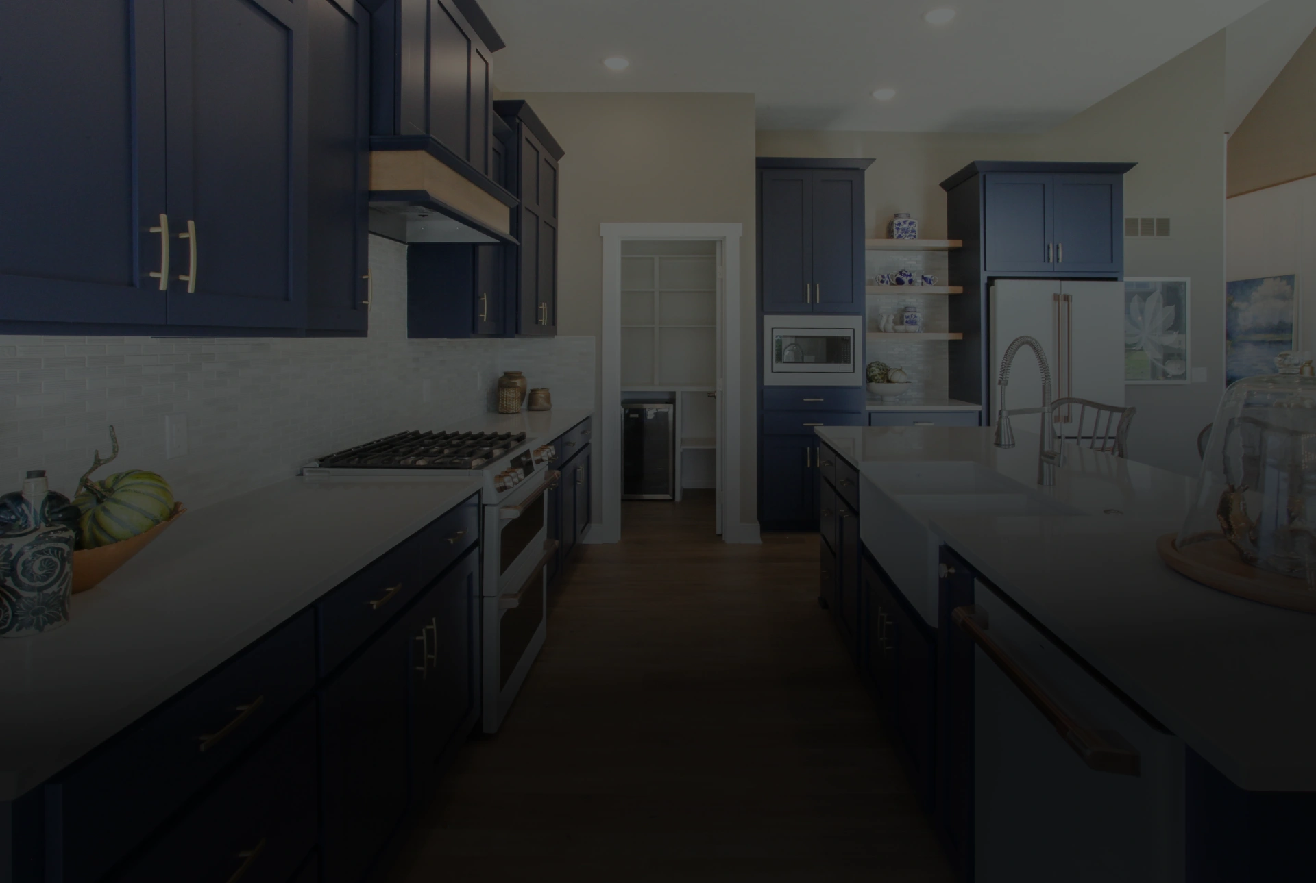 blue cabinet kitchen with overlay and gradient