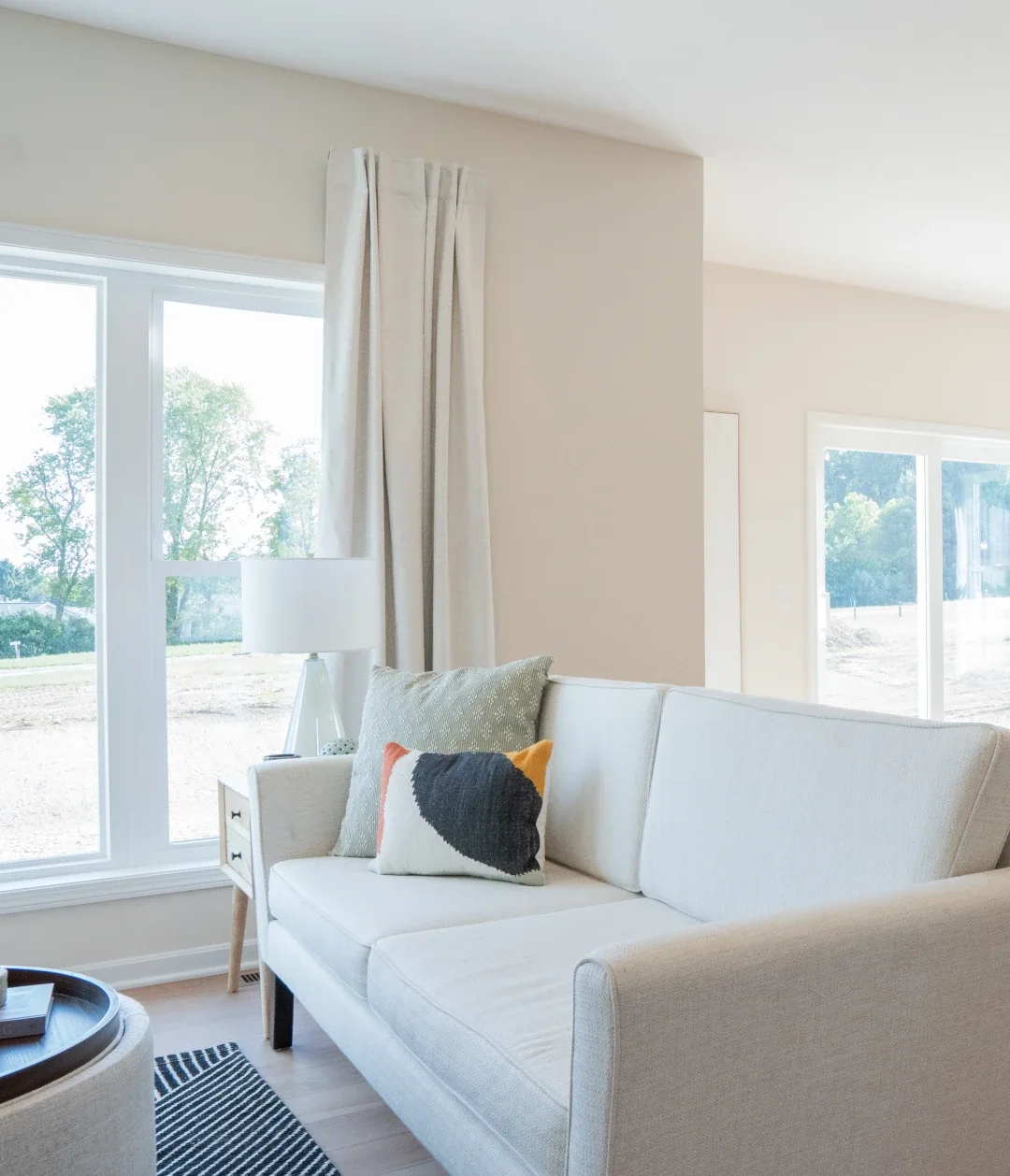 living room couch next to window