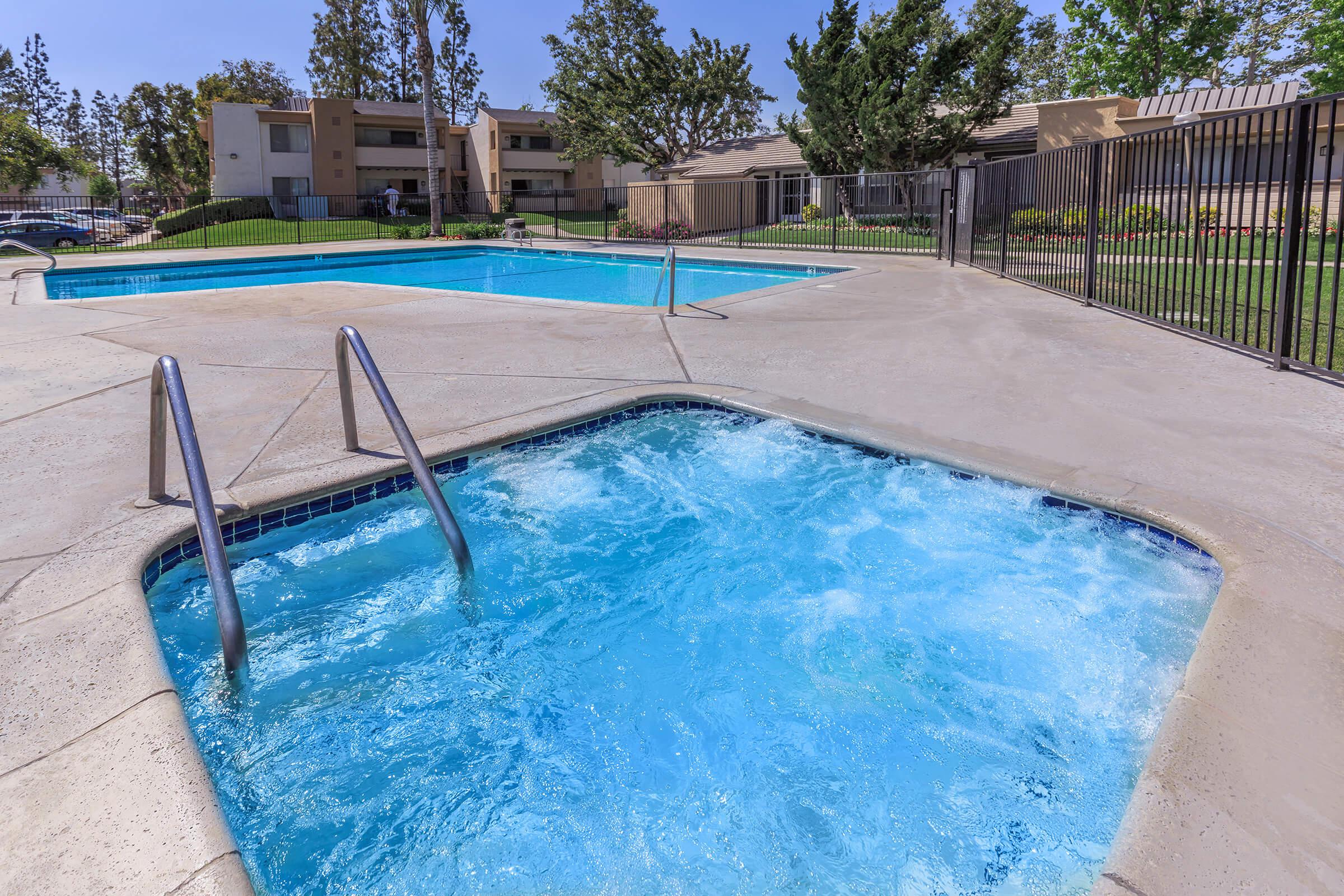Swimming pool and hot tub with 