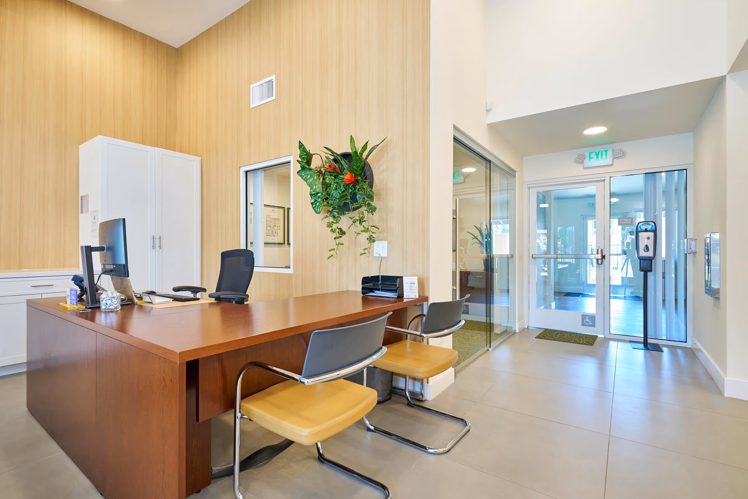 Leasing office desk with chairs and desk with computer