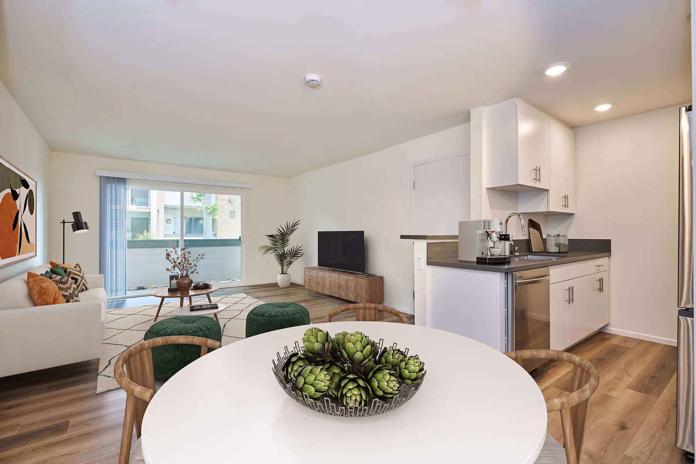 Wide view of Virtually staged dining area with table and chairs