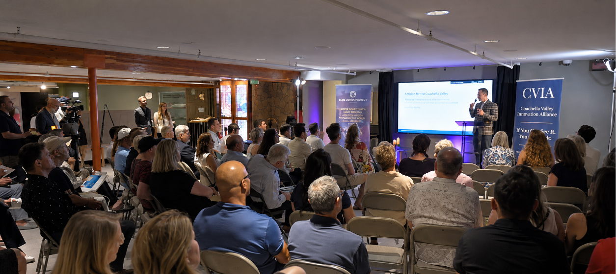Attendees watching a presentation.