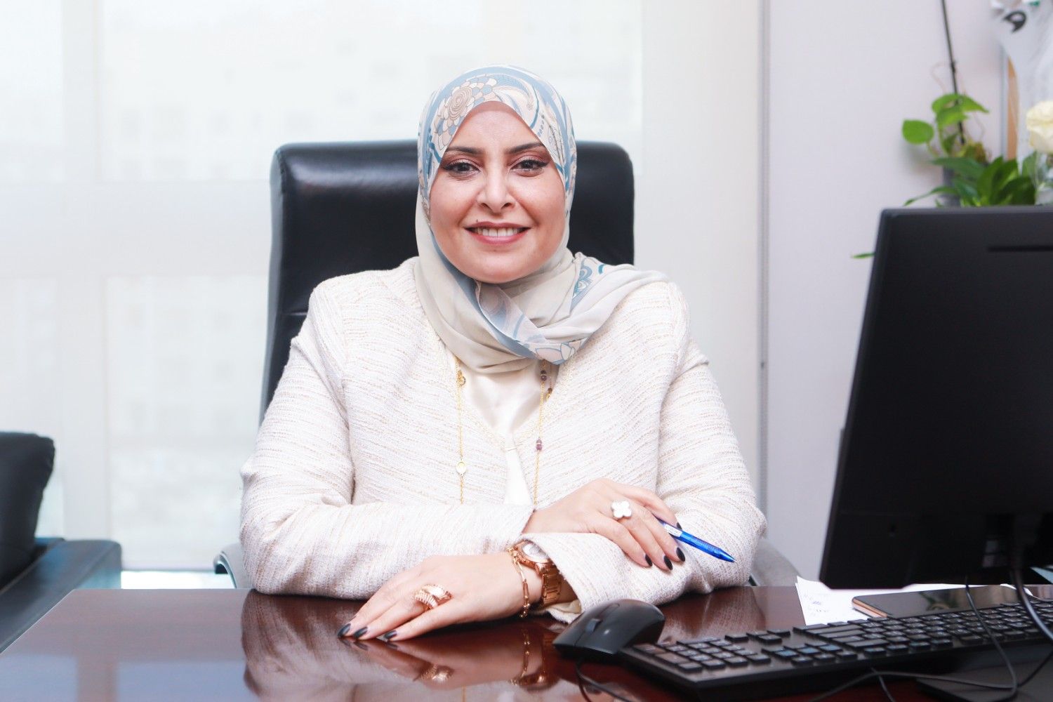 [interface] image of a laptop with ai legal tech software interface in an office