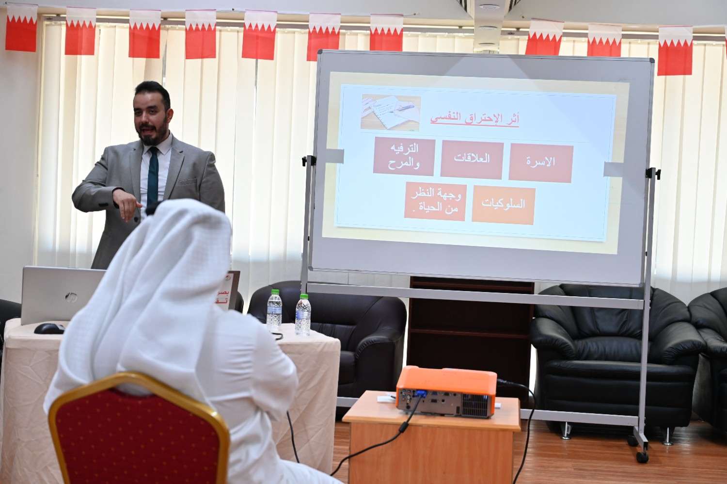 image of members collaborating on a creative project in a bright studio for a nonprofit & charity