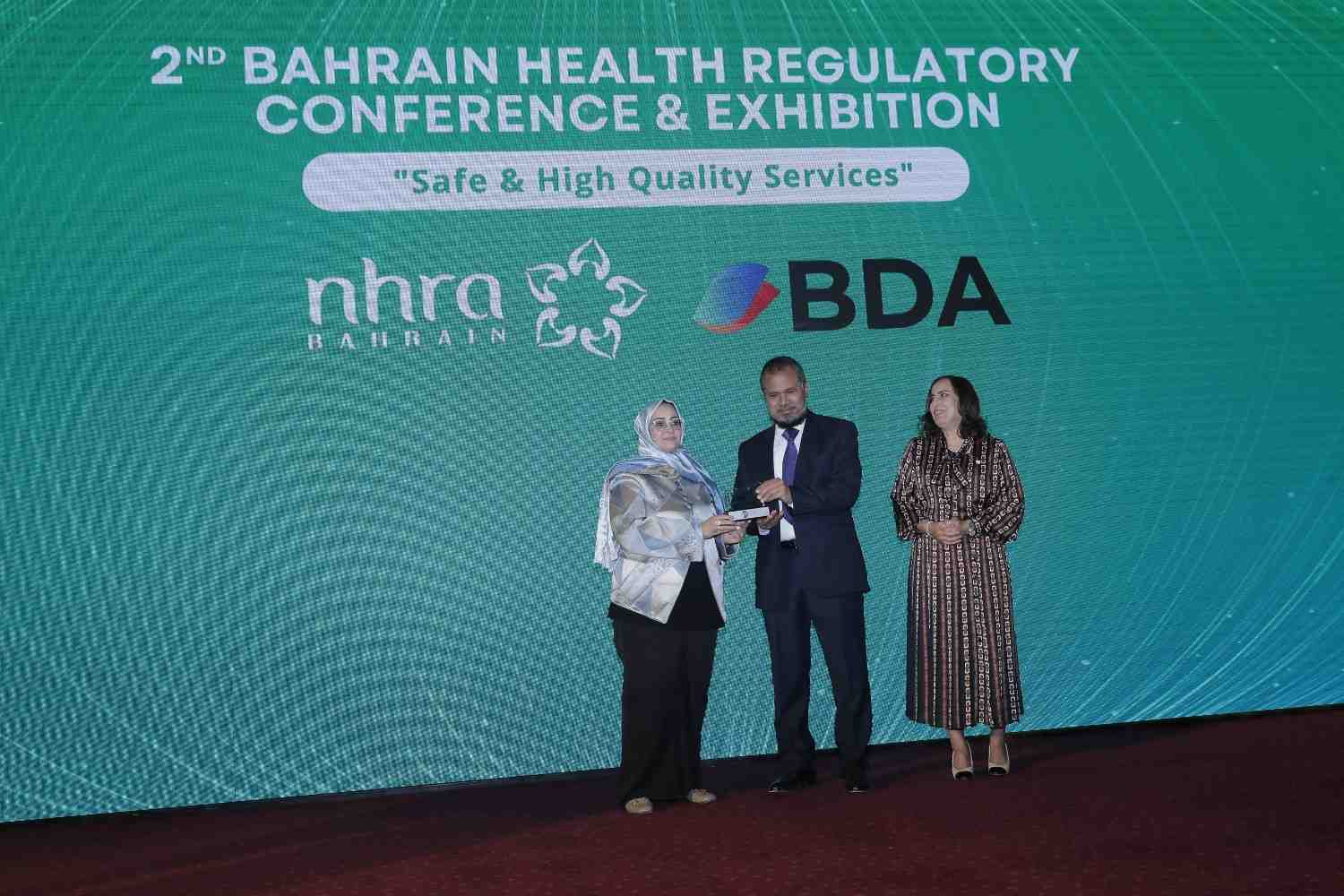 image of student holding a progress certificate