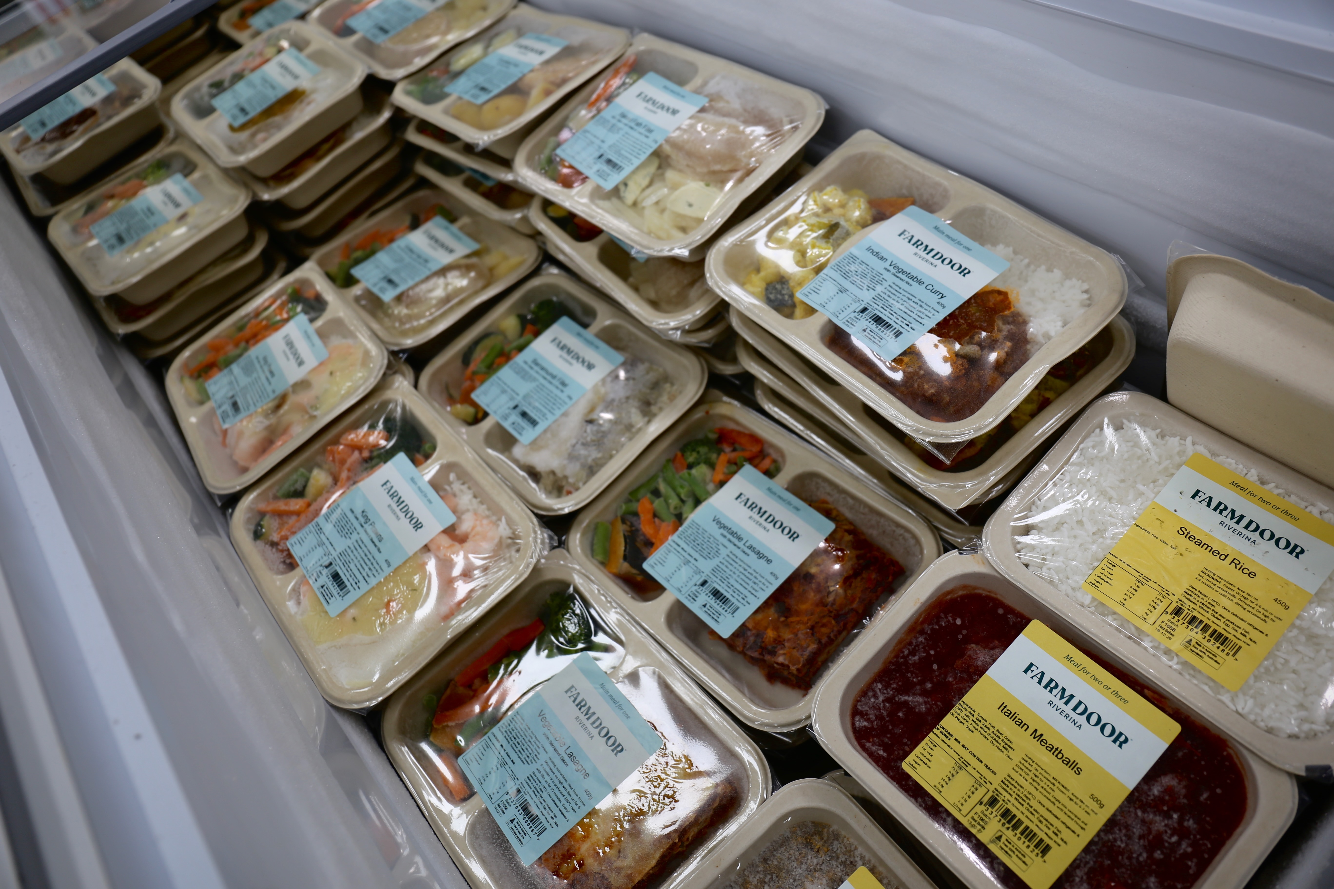 Farm Door Riverina frozen meal trays stocked in a freezer, available at Southcity Community Pharmacy