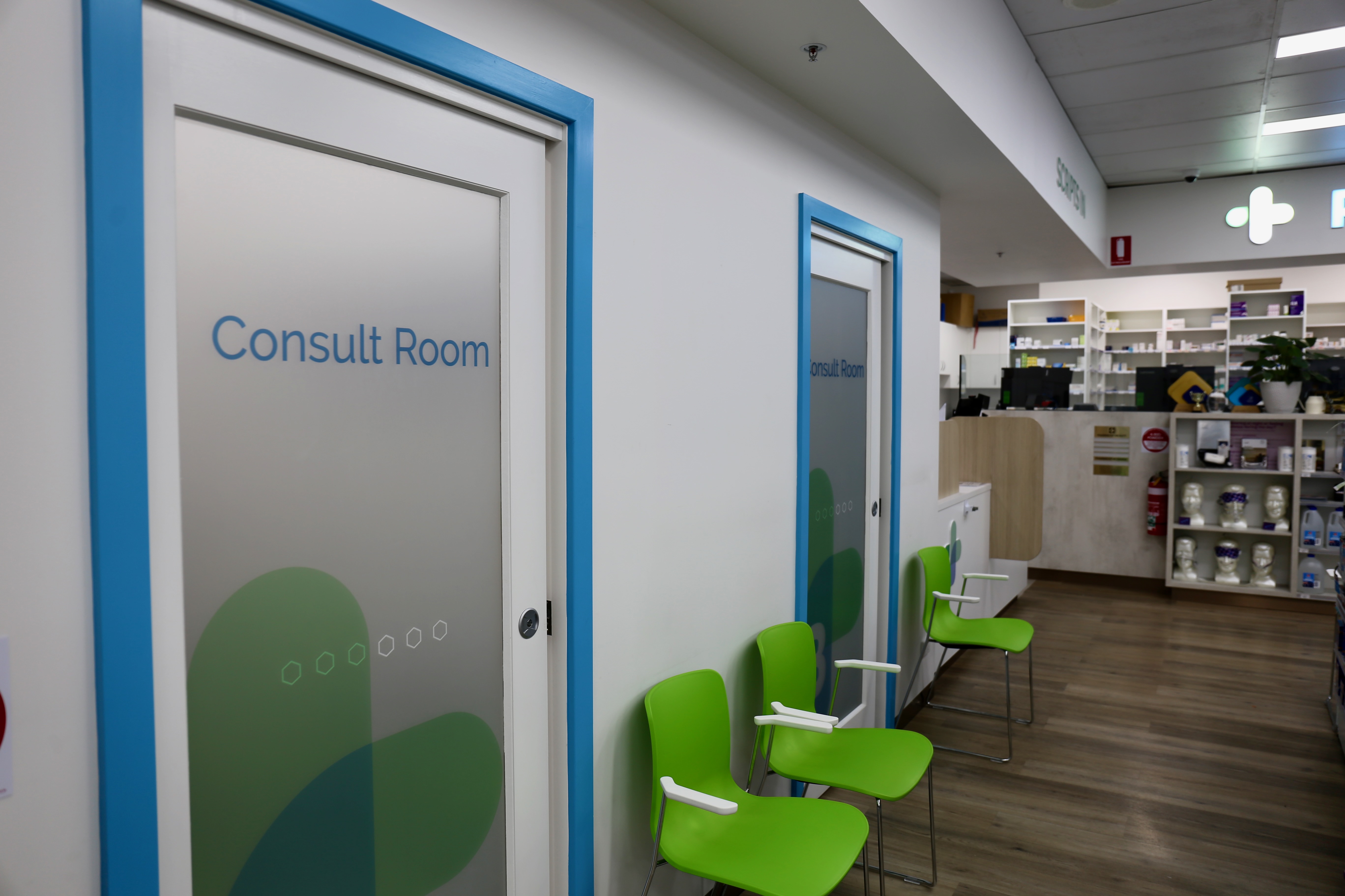 private consult rooms with seating area at Southcity Community Pharmacy, available for patient consultations