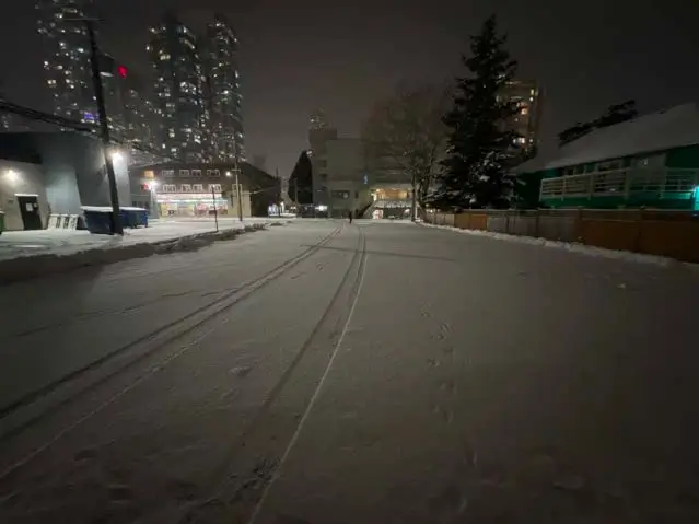 retail plaza parking lot requiring snow removal services