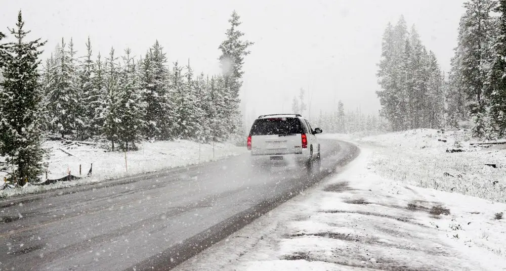 suv driving through winter conditions