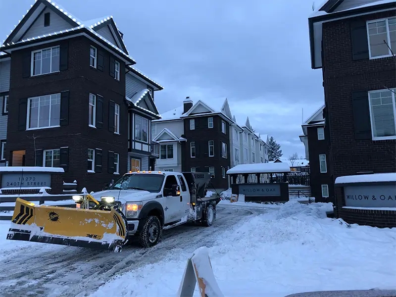 SnowMasters snow removal truck providing winter maintenance service
