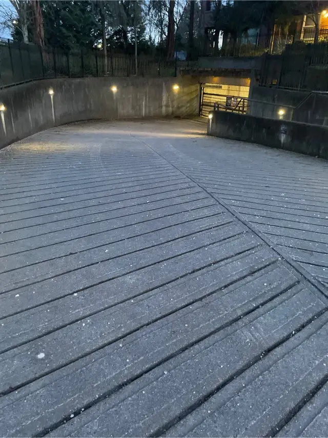 De-icing material applied to a strata parkade ramp in Queensborough, New Westminster