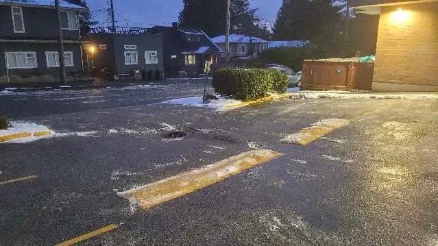 Cleared and de-iced parking area after snow removal in New Westminster