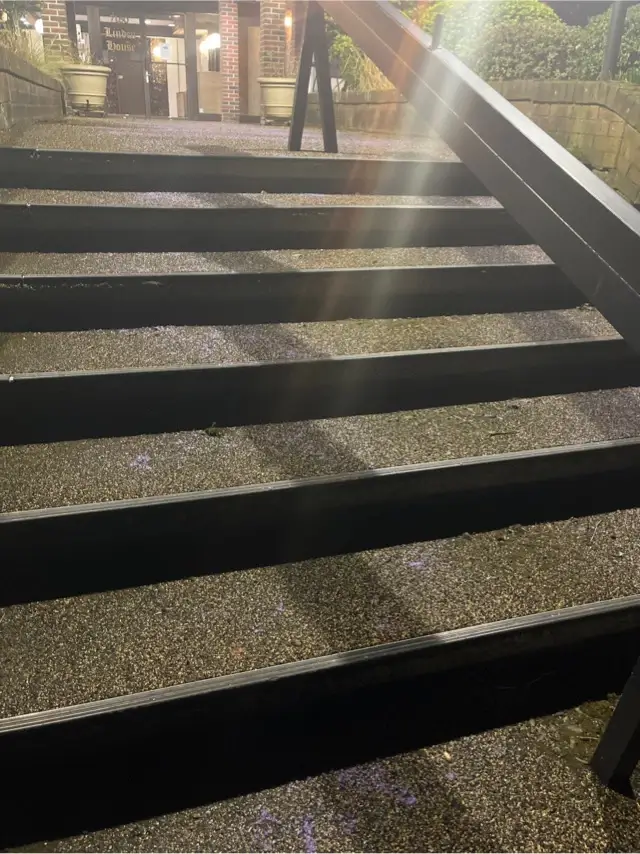 De-icing material applied to exterior stairs at a residential property near Edmonds and Highgate in Burnaby