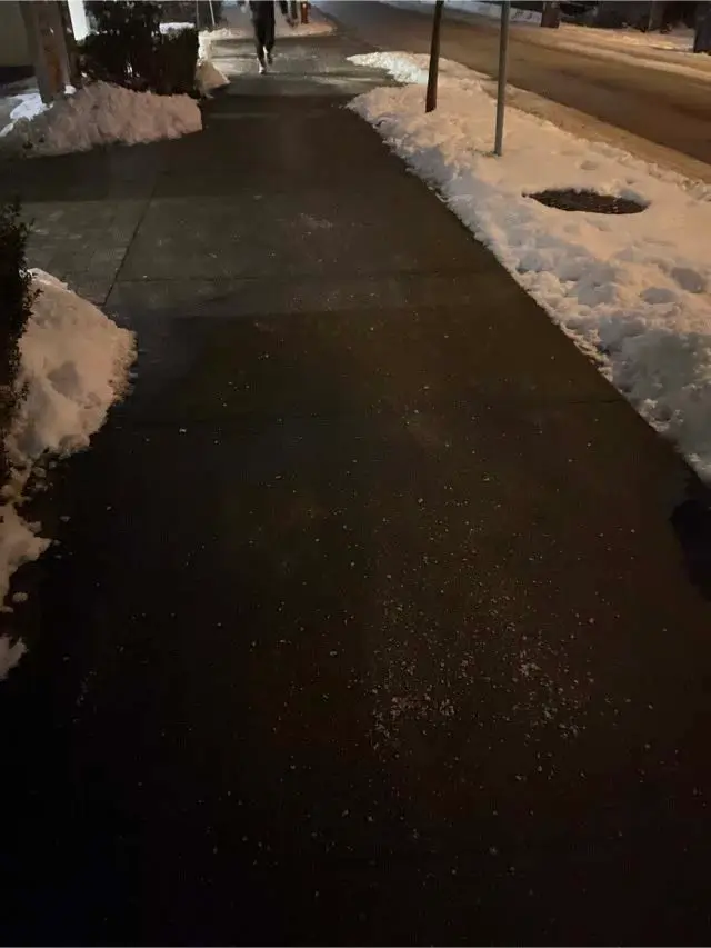 Cleared and de-iced sidewalk at a strata property in Broadmoor, Richmond