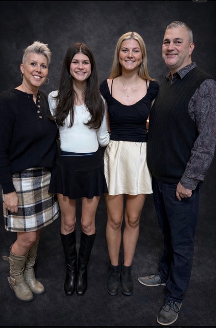 Brandy Vath with her husband and two daughters
