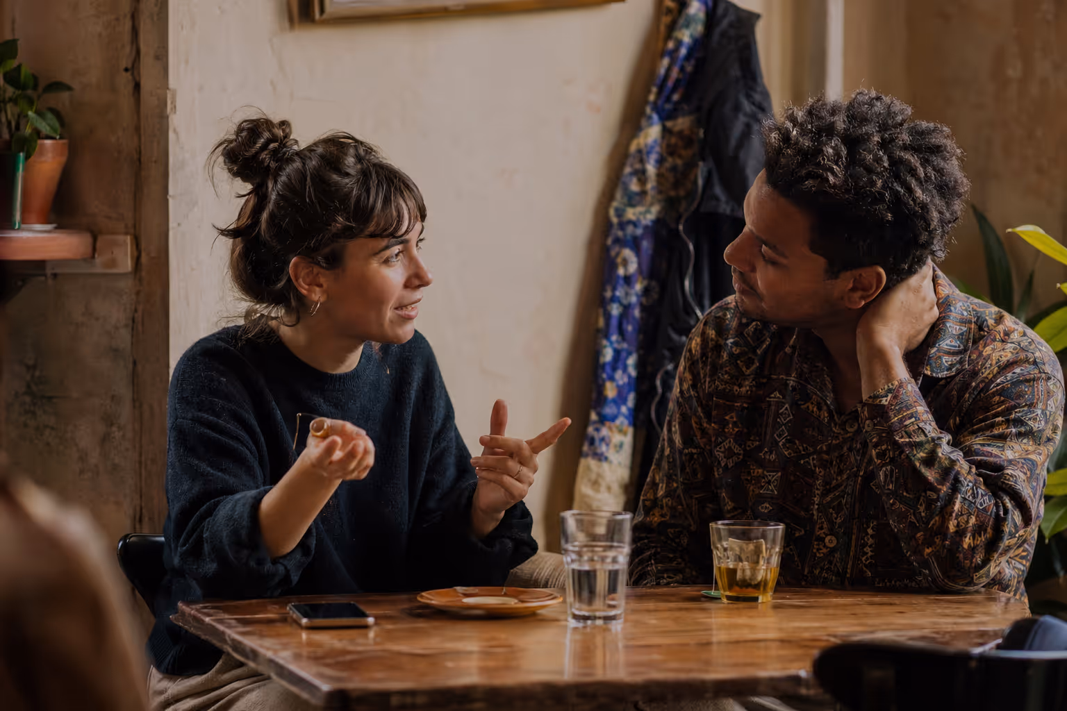 Two people in conversation, practising each other's languages