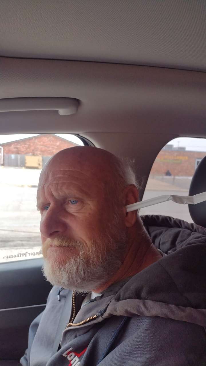 Dad giving side-eye from the car