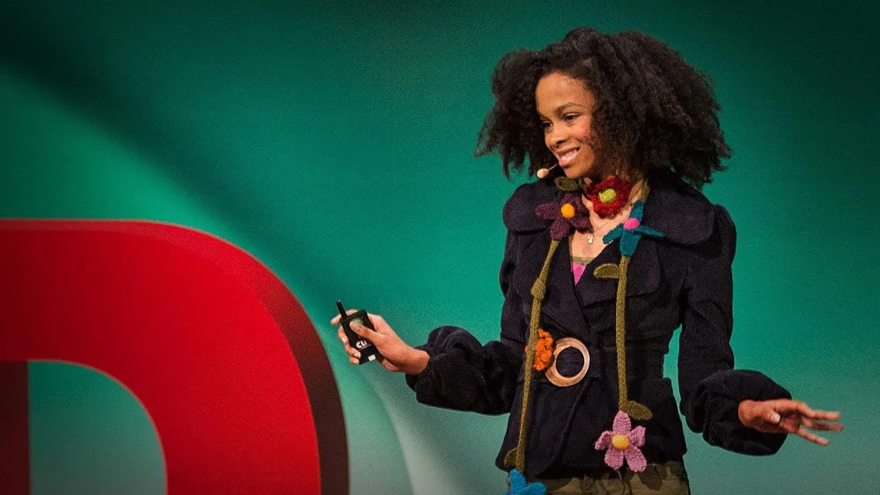 Maya Penn, founder of Maya’s ideas giving a ted talk while wearing her products.