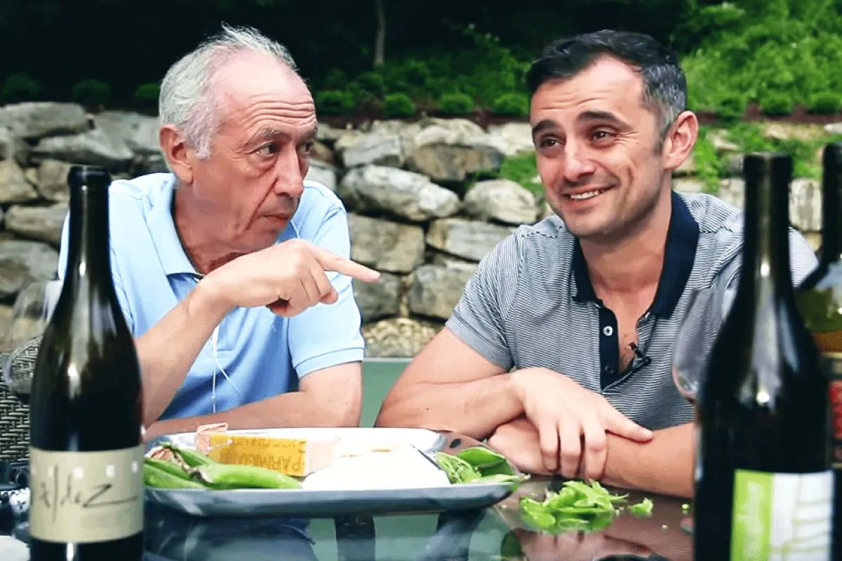 Gary Vee chatting with his father after a meal.