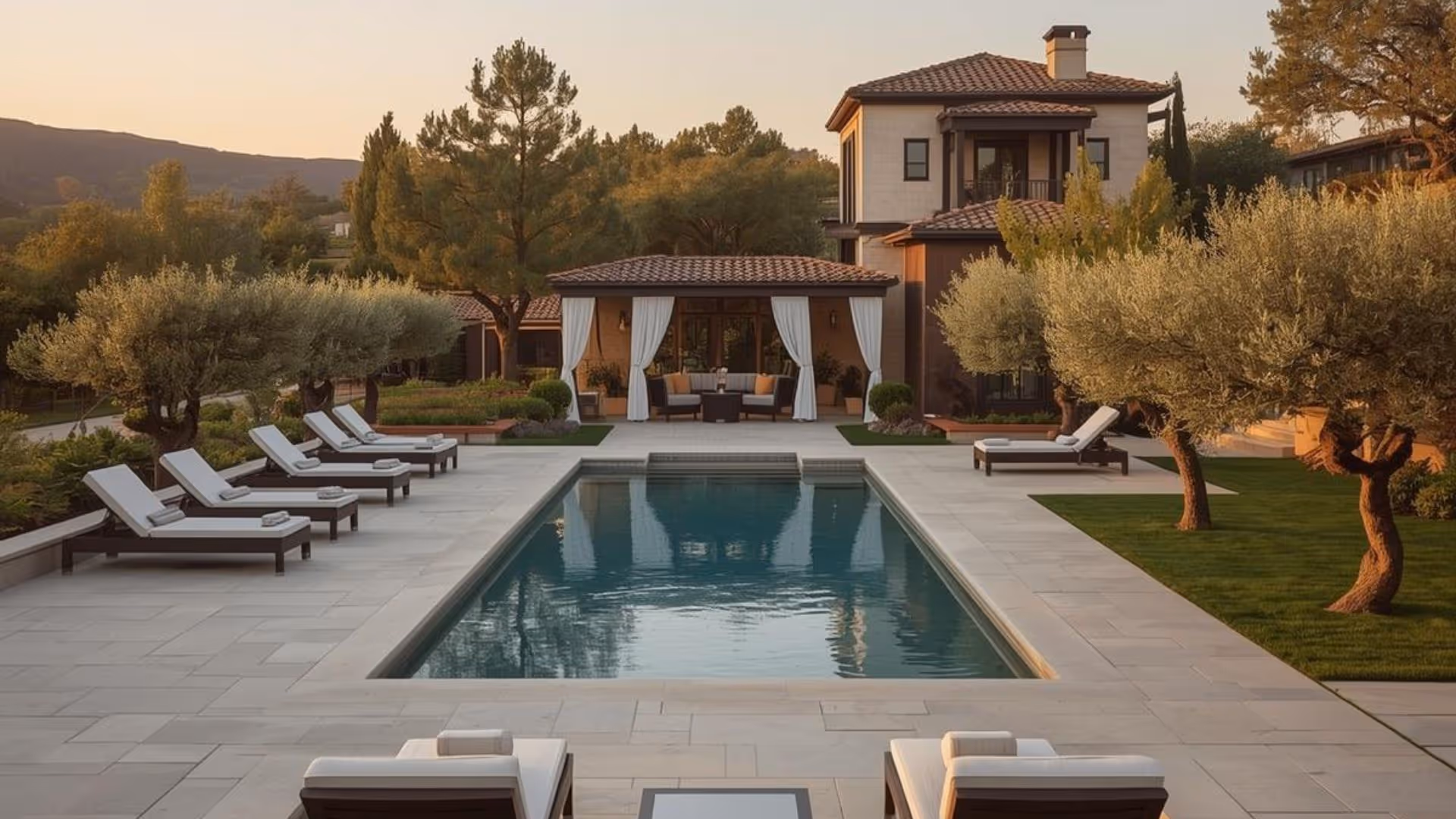 Symmetrical Mediterranean-style estate in Napa Valley with a luxury pool and cabana, reflecting our commitment to high-end property preservation.