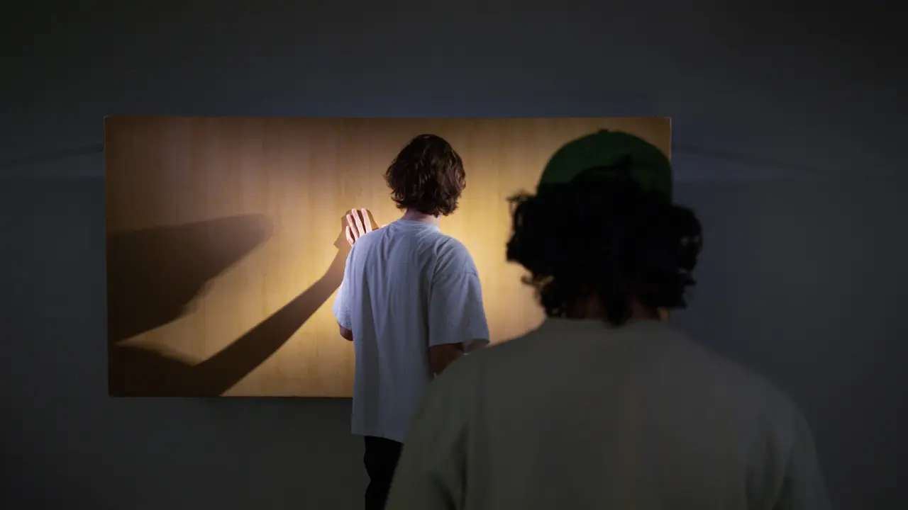 Visitors interacting with SOMA biological computing installation