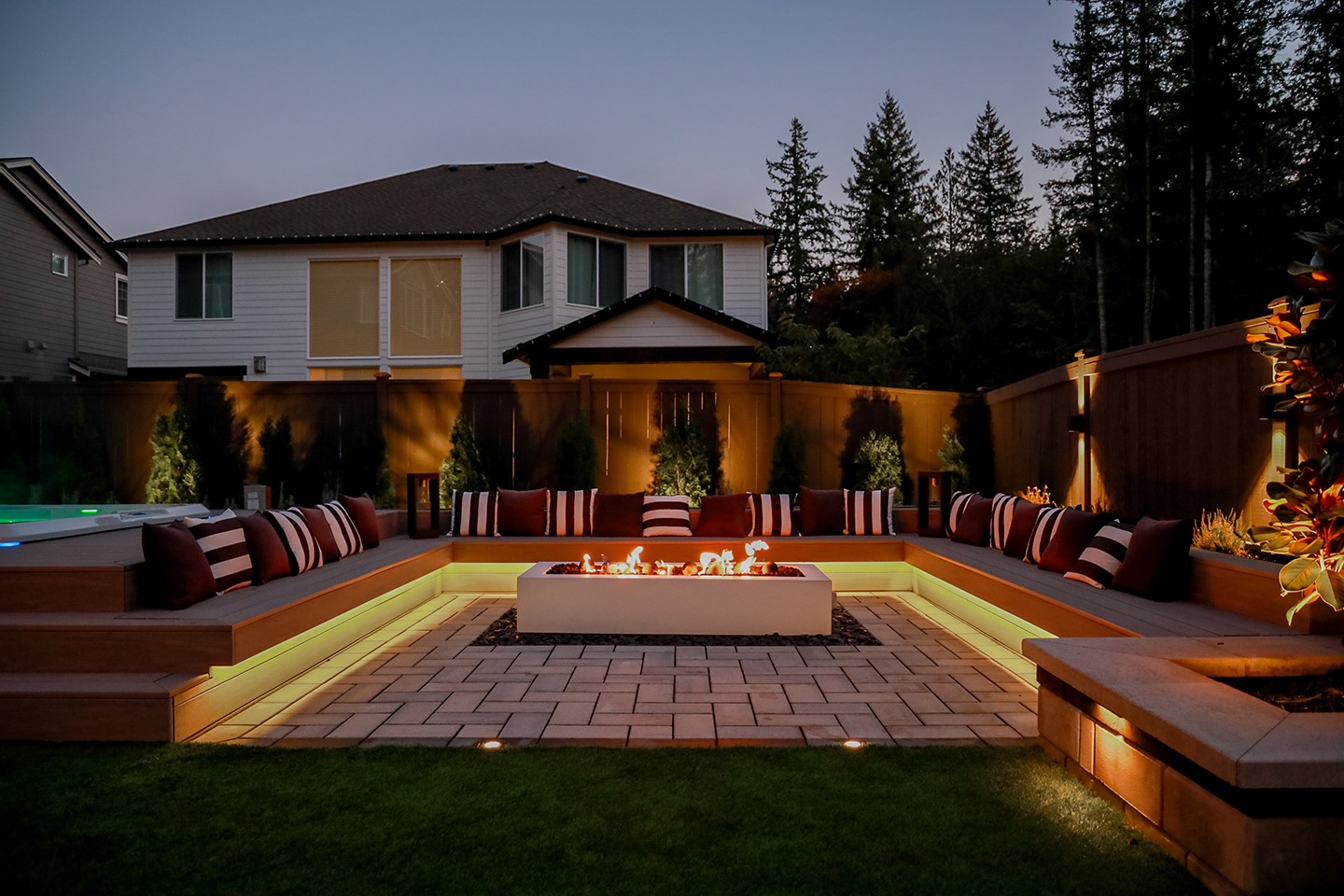 A home in Greater Seattle with a newly remodeled patio with fire pit 