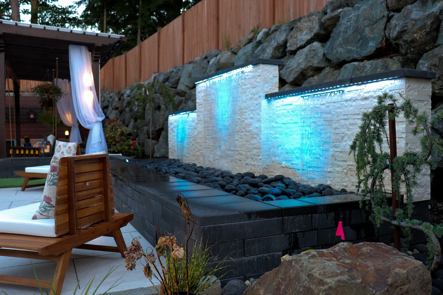 A waterfall fountain designed for added elegance of a homeowner's backyard