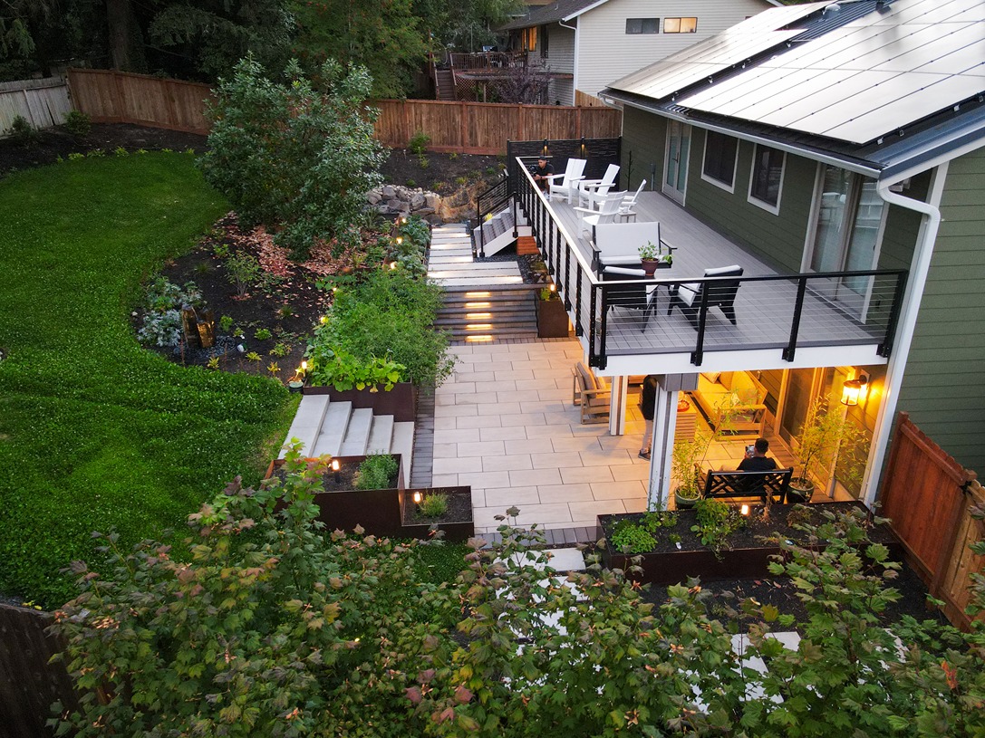 A finished patio with new pavements and greenery that stands out