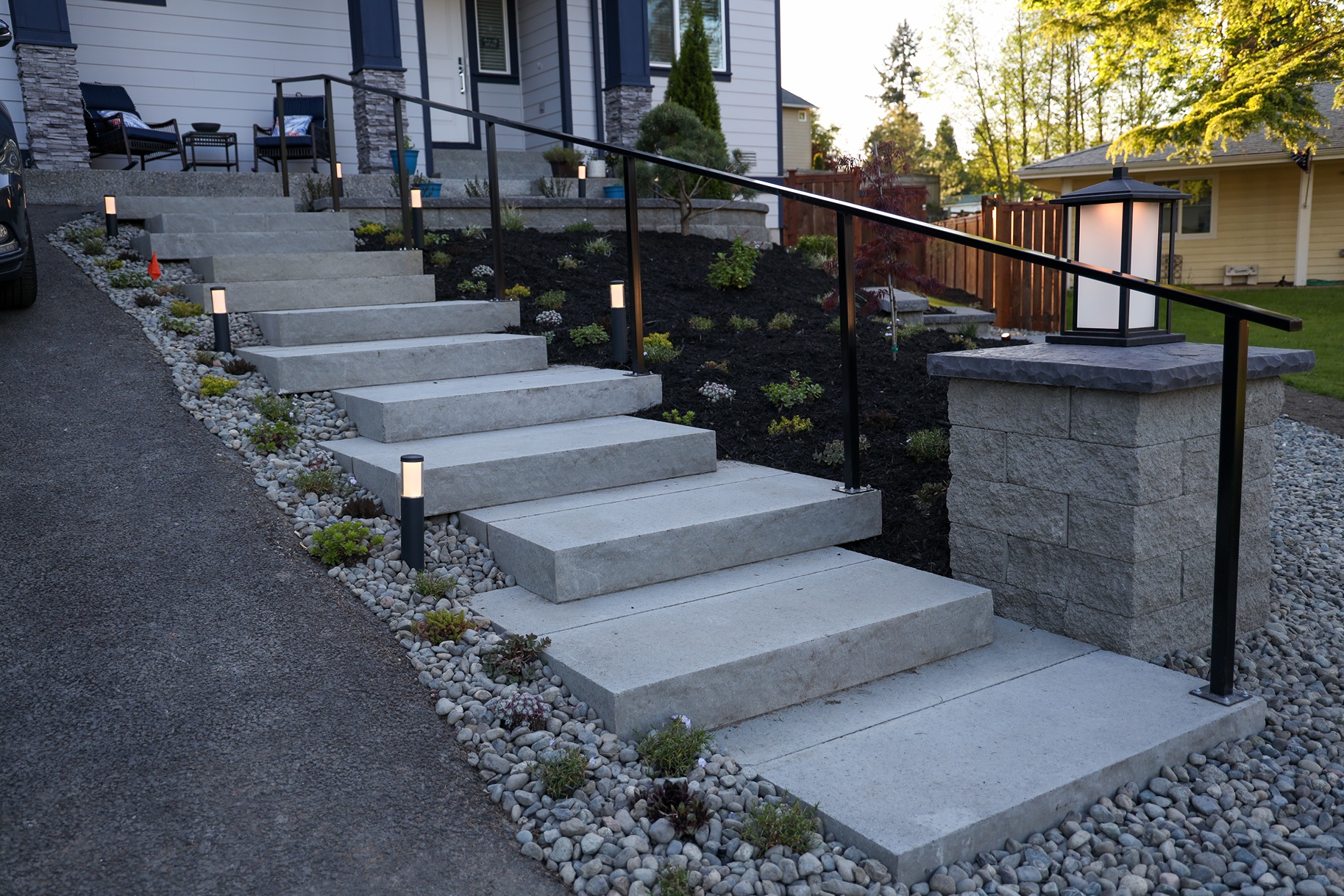 A stairwell with custom lighting installed on each side