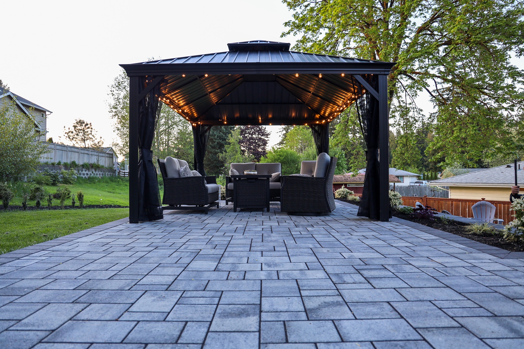A customized pavement of a gazebo built in a homeowner's backyard.