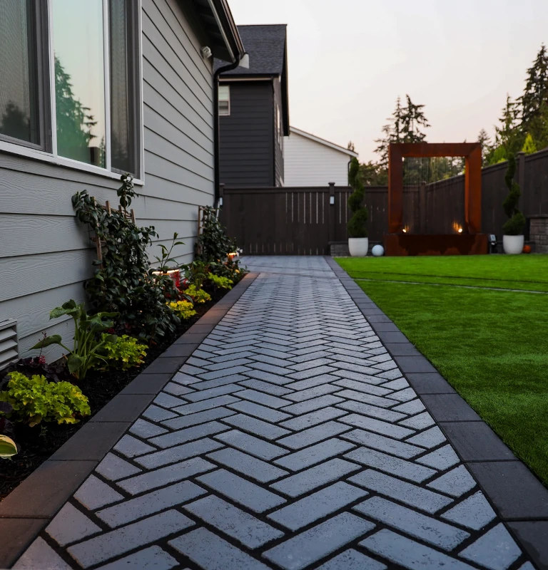 A side of a Greater Seattle home with a stylized walkway installed by a contractor