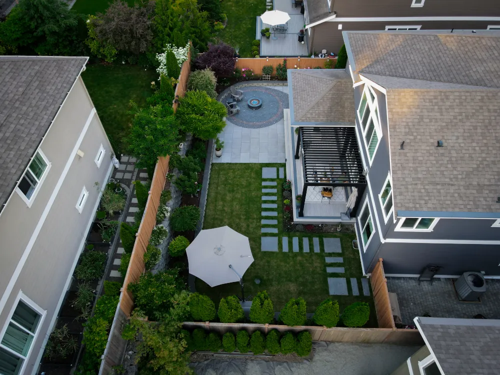 Backyard remodeling with new pavements and fire pit in Seattle