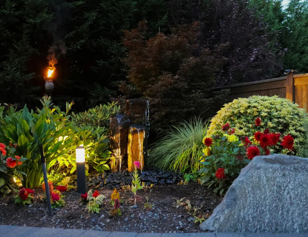 Custom landscape design in Seattle with a small fountain
