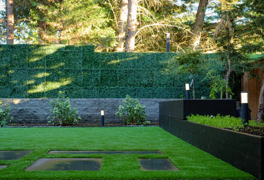 Backyard landscape design in Seattle with shrubs