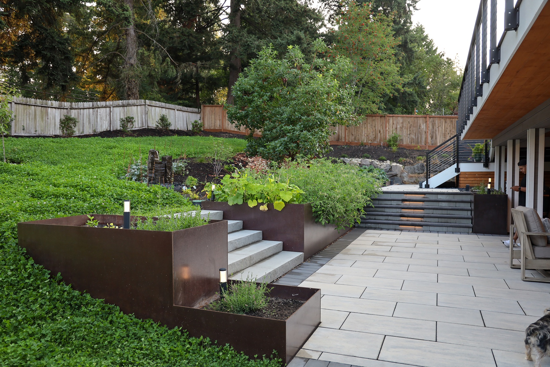 Metal plantboxes and pavers in a hardscaping project in Bellevue