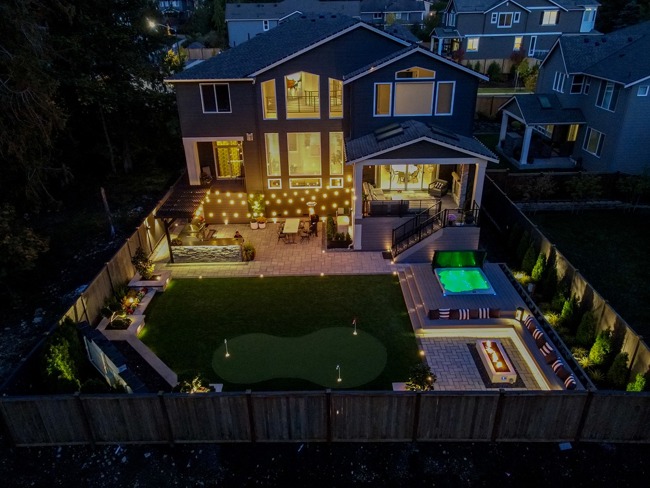 Fully remodeled backyard in Bellevue with mini golf course and outdoor kitchen