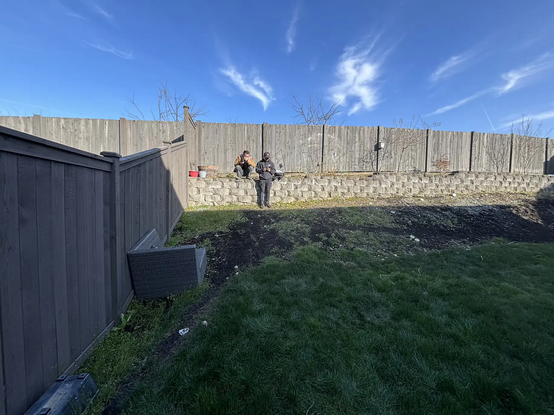 Sloped & Soggy Backyard Transformation Before