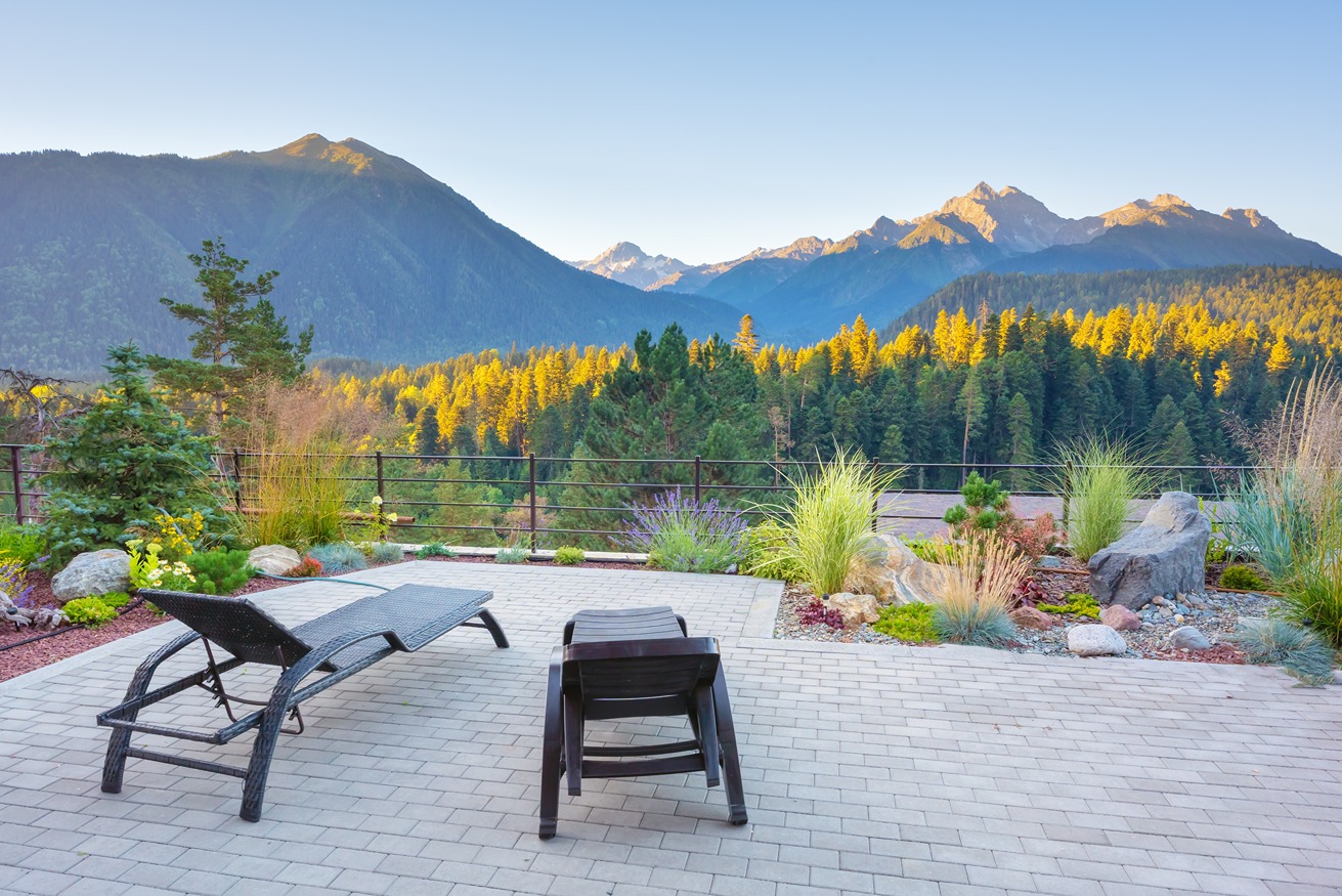 Best patio material for Seattle's weather shown on a finished backyard patio