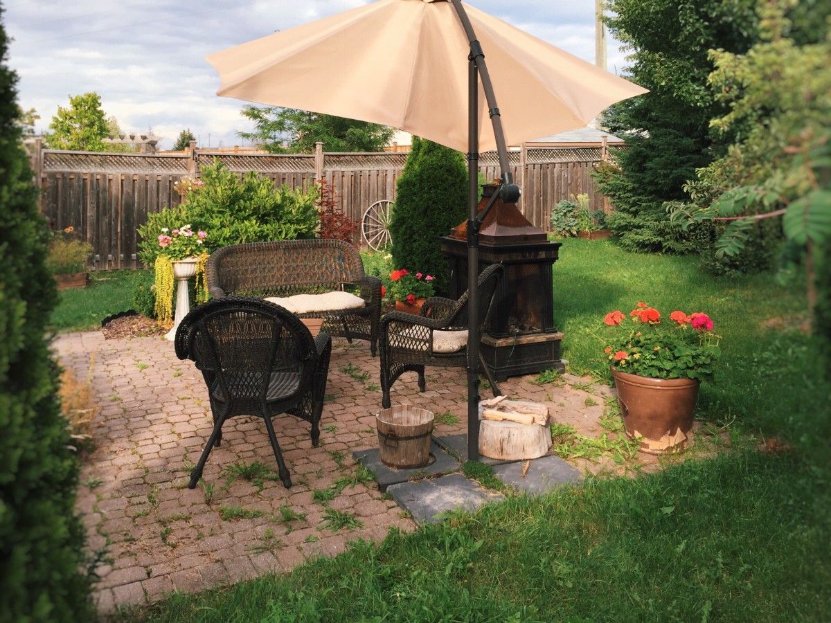 Paver patio resale value shown through a finished Seattle backyard patio